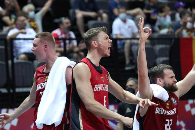 PXL_Russia v Germany - Group A: 2020 FIBA Men s Olympic Qualifying Tournaments SPLIT, CROATIA - JULY 01: German players Jan Niklas Wimberg and Danilo Barthel celebrate victory during the 2020 FIBA Men s Olympic Qualifying Tournament game between Russia and Germany at Spaladium Arena on July 1, 2021 in Split, Croatia. IvoxCagalj PIXSELL