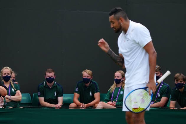 Mandatory Credit: Photo by Javier Garcia Shutterstock (12191440ii) Ground Staff look on at Nick Kyrgios during his second round match Wimbledon Tennis Championships, Day 4, The All England Lawn Tennis and Croquet Club, London, UK - 01 Jul 2021 Wimbledon Tennis Championships, Day 4, The All England Lawn Tennis and Croquet Club, London, UK - 01 Jul 2021  Copyright: xJavierxGarcia Shutterstockx 12191440ii