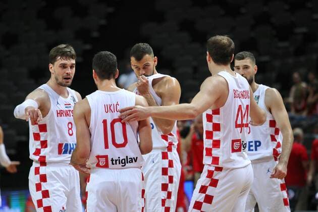 PXL_Croatia v Tunisia - Group A: 2020 FIBA Men s Olympic Qualifying Tournaments SPLIT, CROATIA - JULY 01: Croatian players Mario Hezonja, Roko Leni Ukic, Ante Zizic, Bojan Bogdanovic discuss on the field during the 2020 FIBA Men s Olympic Qualifying Tournament game between Croatia and Tunisia at Spaladium Arena on July 1, 2021 in Split, Croatia. IvoxCagalj PIXSELL