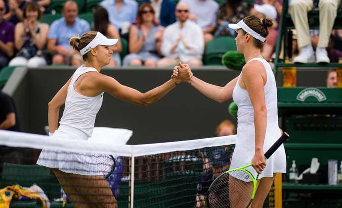 Mandatory Credit: Photo by Rob Prange Shutterstock (12191441ge) Magda Linette of Poland & Elina Svitolina of Ukraine in action during the second round of the 2021 Wimbledon Championships Grand Slam tennis tournament Wimbledon Tennis Championships, Day 4, The All England Lawn Tennis and Croquet Club, London, UK - 01 Jul 2021 Wimbledon Tennis Championships, Day 4, The All England Lawn Tennis and Croquet Club, London, UK - 01 Jul 2021  Copyright: xRobxPrange Shutterstockx 12191441ge