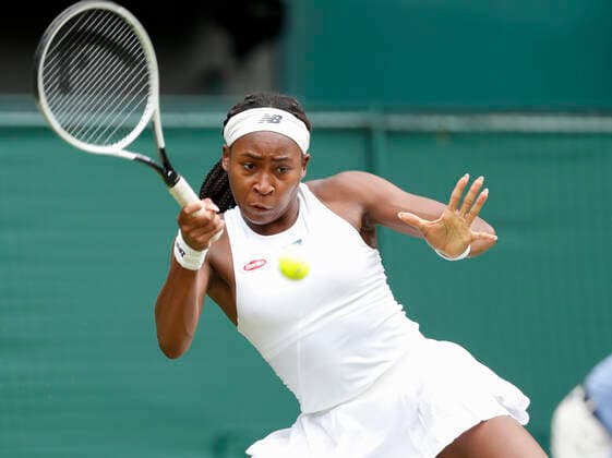 (210702) -- LONDON, July 2, 2021 -- Coco Gauff of the United States competes during the women s singles second round match between Coco Gauff of the United States and Elena Vesnina of Russia at Wimbledon Championship in London, Britain, on July 1, 2021. ) (SP)BRITAIN-LONDON-TENNIS-WIMBLEDON-DAY 4 HanxYan 