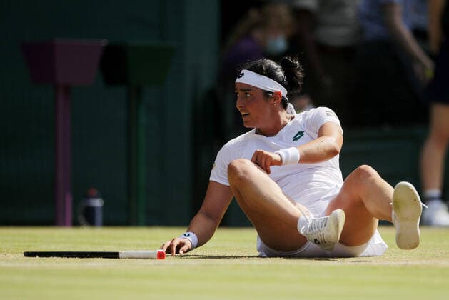 Mandatory Credit: Photo by Shutterstock (12193047r) Ons Jabeur of Tunisia celebrates on match point Wimbledon Tennis Championships, Day 5, The All England Lawn Tennis and Croquet Club, London, UK - 02 Jul 2021 Wimbledon Tennis Championships, Day 5, The All England Lawn Tennis and Croquet Club, London, UK - 02 Jul 2021  Copyright: xShutterstockx 12193047r
