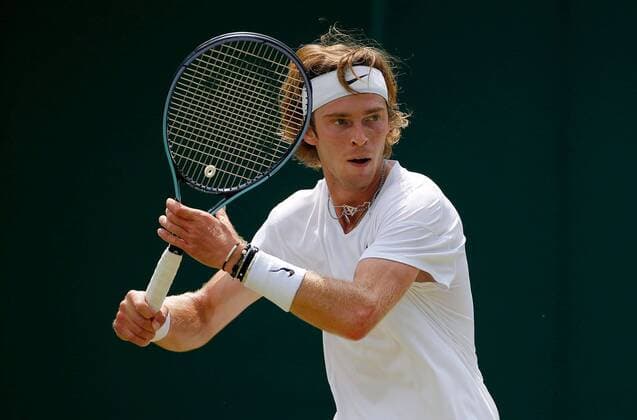 Mandatory Credit: Photo by Shutterstock (12193047aw) Andrey Rublev of Russia in action Wimbledon Tennis Championships, Day 5, The All England Lawn Tennis and Croquet Club, London, UK - 02 Jul 2021 Wimbledon Tennis Championships, Day 5, The All England Lawn Tennis and Croquet Club, London, UK - 02 Jul 2021  Copyright: xShutterstockx 12193047aw