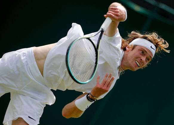 Mandatory Credit: Photo by Shutterstock (12193047ax) Andrey Rublev of Russia in action Wimbledon Tennis Championships, Day 5, The All England Lawn Tennis and Croquet Club, London, UK - 02 Jul 2021 Wimbledon Tennis Championships, Day 5, The All England Lawn Tennis and Croquet Club, London, UK - 02 Jul 2021  Copyright: xShutterstockx 12193047ax