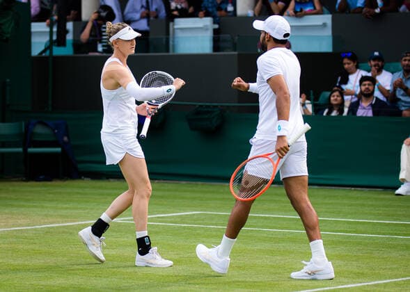 July 2, 2021: Divij Sharan of India & Samantha Murray Sharan of Great Britain playing mixed doubles at the 2021 Wimbledon Championships Grand Slam tennis tournament - ZUMAa181 20210702_zaa_a181_078 Copyright: xRobxPrangex
