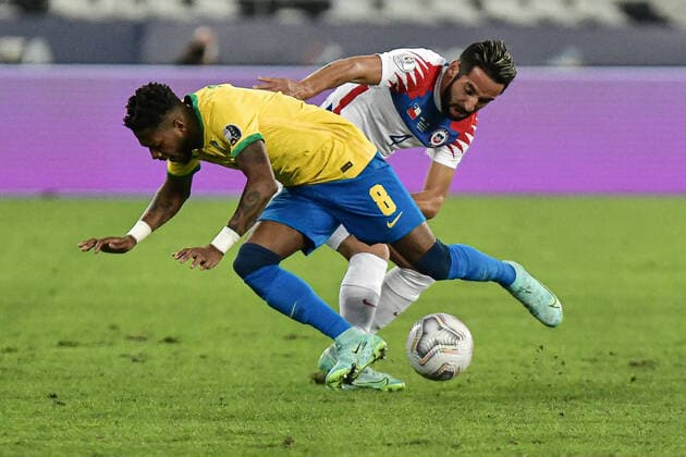 2nd July 2021; Nilton Santos Stadium, Rio de Janeiro, Brazil; Copa America, Brazil versus Chile; Fred of Brazil is fouled by Mauricio Isla of Chile  ActionPlus12301928 MarcelloxDias