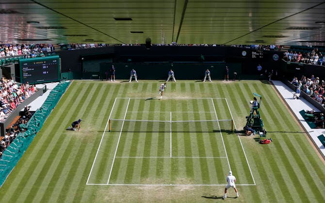 (210703) -- LONDON, July 3, 2021 -- Novak Djokovic of Serbia and Denis Kudla of the United States compete during the men s singles third round match between Novak Djokovic of Serbia and Denis Kudla of the United States at Wimbledon tennis Championship in London, Britain, on July 2, 2021. ) (SP)BRITAIN-LONDON-TENNIS-WIMBLEDON-DAY 5 HanxYan 