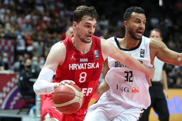 Germany v Croatia - Semi Final: 2020 FIBA Men s Olympic Qualifying Tournament Mario Hezonja of Croatia in action against Johannes Thiemann of Germany during the 2020 FIBA Men s Olympic Qualifying Tournament game between Germany and Croatia at Spaladium Arena on July 3, 2021 in Split, Croatia. IvoxCagalj PIXSELL