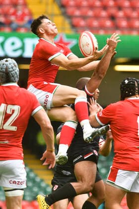Rugby Union - 2021 Summer International - Wales vs Canada - Principality Stadium Tom Rogers (Scarlets); leaps to take the ball from a kick off COLORSPORT WINSTON BYNORTH 
