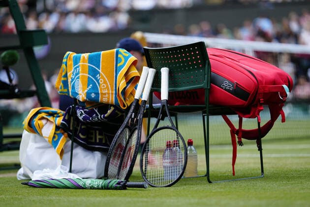 Mandatory Credit: Photo by Dave Shopland Shutterstock (12194409fz) The tennis bag (and contents) of Roger Federer during his third round match Wimbledon Tennis Championships, Day 6, The All England Lawn Tennis and Croquet Club, London, UK - 03 Jul 2021 Wimbledon Tennis Championships, Day 6, The All England Lawn Tennis and Croquet Club, London, UK - 03 Jul 2021  Copyright: xDavexShopland Shutterstockx 12194409fz