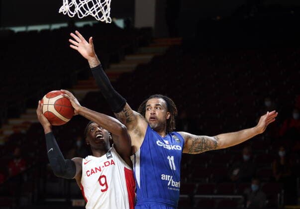 July 3, 2021, Victoria, BC, Canada: Canada s RJ Barrett is blocked by Czech Republic s Blake Schilb during the second half of FIBA Men s Olympic Qualifying semifinal basketball action at Memorial Arena in Victoria, B.C., on Saturday, July 3, 2021. RJ Barrett,Blake Schilb  - ZUMAc35_ 20210703_zaf_c35_027 Copyright: xChadxHipolitox