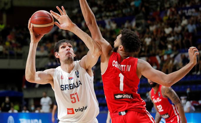 (210704) -- BELGRADE, July 4, 2021 -- Serbia s Boban Marjnovic (L) vies with Puerto Rico s George Conditt during FIBA Olympic Qualifying Tournament basketball semi-final match between Serbia and Puerto Rico in Belgrade, Serbia on July 3, 2021. (Photo by Xinhua) (SP)SERBIA-BELGRADE-BASKETBALL-FIBA OQT-SEMI-FINALS-SERBIA VS PUERTO RICO PredragxMilosavljevic 