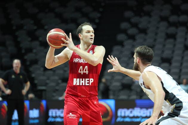 (210704) -- SPLIT, July 4, 2021 -- Bojan Bogdanovic (L) of Croatia competes during the 2020 FIBA Olympic Qualifying Tournament semi-final match between Croatia and Germany in Split, Croatia, July 3, 2021. ( Pixsell via Xinhua) (SP) CROATIA-SPLIT-FIBA OQT-SEMI-FINALS-CROATIA VS GERMANY IvoxCagalj 