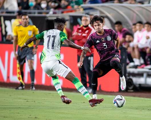 Carlos Salcedo 3 of the Mexican national team, Nationalteam is defended by Charles Atshimene 11 of the National Team of Nigeria during their MexTour game on Saturday, July 3, 2021 at the Los Angeles Memorial Coliseum in Los Angeles, California (EE.UU.). Mexico vs. Nigeria !ACHTUNG: NUR REDAKTIONELLE NUTZUNG!  Copyright: xARMANDOxARORIZOx AME135 20210704-fe28787029932136bee56ee92932542a8577949f