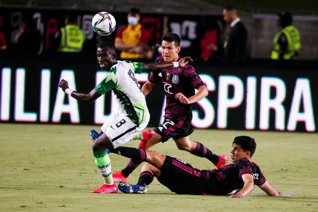 July 3, 2021, Los Angeles, California, USA: Nigeria midfielder Onwuasonaya Uche (8) vies the ball aganist Mexico defender Erick Gutierrez (14) and Mexico defender Hirving Lozano (22) during the first half of an International Friendly, Länderspiel, Nationalmannschaft soccer match between Nigeria and Mexico at the Los Angeles Memorial Coliseum in Los Angeles, Saturday, July. 3, 2021. Los Angeles USA - ZUMAc68_ 20210703_zaf_c68_008 Copyright: xRingoxChiux