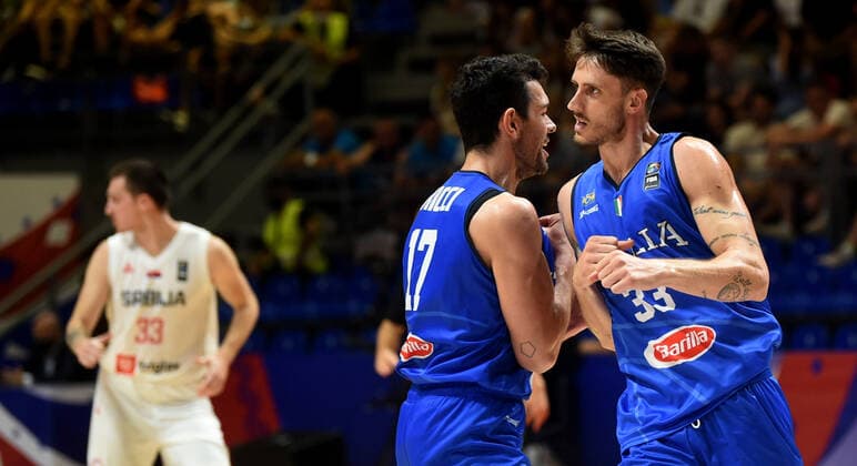 04.07.2021 Belgrade Serbia-Italy FIBA Olympic qualifying tournament final men s basketball Achille Polonara (R) with Giampaolo Ricci(C) Italy celebrate during match :Str