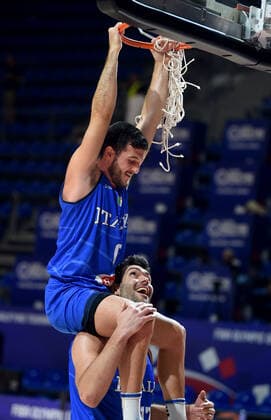 04.07.2021 Belgrade Serbia-Italy FIBA Olympic qualifying tournament final men s basketball Giampaolo Ricci(down) with Marco Spissu (up) Italy celebrate victory :Str