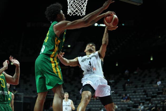 Sport Bilder des Tages (210705) -- SPLIT (CROATIA), July 5, 2021 -- Maodo Lo (R) of Germany is blocked by Bruno Caboclo of Brazil during the 2020 FIBA Men s Olympic Qualifying Tournament final match between Germany and Brazil in Split, Croatia, July 4, 2021. ( Pixsell via Xinhua) (SP)CROATIA-SPLIT-FIBA OQT-FINALS-BRAZIL VS GERMANY IvoxCagalj 