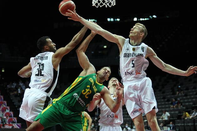 (210705) -- SPLIT (CROATIA), July 5, 2021 -- Rafael Hettsheimeir (C) of Brazil vies with Johannes Thiemann (L) and Niels Giffey of Germany during the 2020 FIBA Men s Olympic Qualifying Tournament final match between Germany and Brazil in Split, Croatia, July 4, 2021. ( Pixsell via Xinhua) (SP)CROATIA-SPLIT-FIBA OQT-FINALS-BRAZIL VS GERMANY IvoxCagalj 