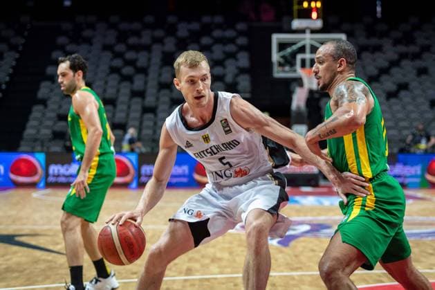 Basketball Split 04.07.2021 Olympia-Qualifikation FIBA Olympic Qualifying Tournament 2020 Finale Deutschland (GER) - Brasilien (BRA) Nils Giffey (Deutschland, No.05) Alex Garcia (Brasilien, No.10)