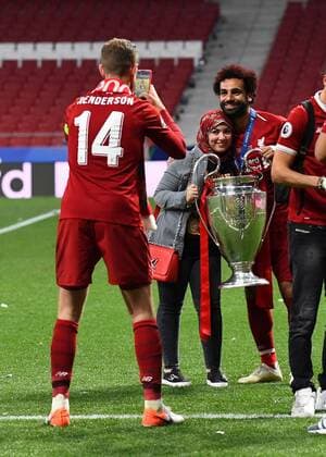Mandatory Credit: Photo by BPI Shutterstock (10266556np) Jordan Henderson takes a photo of Mohamed Salah of Liverpool with his wife Magi Tottenham Hotspur v Liverpool, UEFA Champions League Final, Football, Wanda Metropolitano Stadium, Madrid, Spain - 01 Jun 2019 Editorial use only Tottenham Hotspur v Liverpool, UEFA Champions League Final, Football, Wanda Metropolitano Stadium, Madrid, Spain - 01 Jun 2019 Editorial use only  Copyright: xBPI Shutterstockx 10266556np
