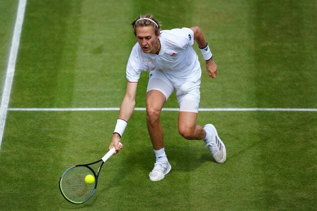 Mandatory Credit: Photo by Shutterstock (12196118l) Sebastian Korda during his fourth round match Wimbledon Tennis Championships, Day 7, The All England Lawn Tennis and Croquet Club, London, UK - 05 Jul 2021 Wimbledon Tennis Championships, Day 7, The All England Lawn Tennis and Croquet Club, London, UK - 05 Jul 2021  Copyright: xShutterstockx 12196118l
