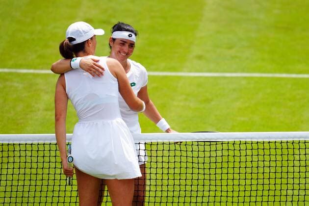 Mandatory Credit: Photo by Javier Garcia Shutterstock (12196117al) Ons Jabeur celebrates victory in her fourth round match and is congratulated by Iga Swiatek Wimbledon Tennis Championships, Day 7, The All England Lawn Tennis and Croquet Club, London, UK - 05 Jul 2021 Wimbledon Tennis Championships, Day 7, The All England Lawn Tennis and Croquet Club, London, UK - 05 Jul 2021  Copyright: xJavierxGarcia Shutterstockx 12196117al
