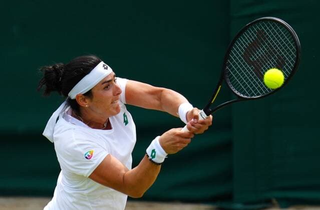 Mandatory Credit: Photo by Javier Garcia Shutterstock (12196117am) Ons Jabeur during her fourth round match Wimbledon Tennis Championships, Day 7, The All England Lawn Tennis and Croquet Club, London, UK - 05 Jul 2021 Wimbledon Tennis Championships, Day 7, The All England Lawn Tennis and Croquet Club, London, UK - 05 Jul 2021  Copyright: xJavierxGarcia Shutterstockx 12196117am