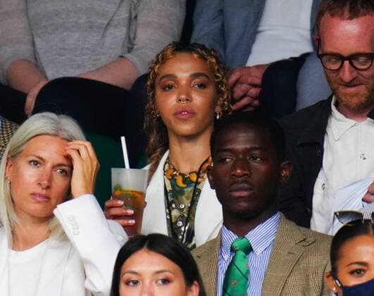 Mandatory Credit: Photo by Javier Garcia Shutterstock (12196117dx) FKA Twigs in the crowd on Centre Court Wimbledon Tennis Championships, Day 7, The All England Lawn Tennis and Croquet Club, London, UK - 05 Jul 2021 Wimbledon Tennis Championships, Day 7, The All England Lawn Tennis and Croquet Club, London, UK - 05 Jul 2021  Copyright: xJavierxGarcia Shutterstockx 12196117dx