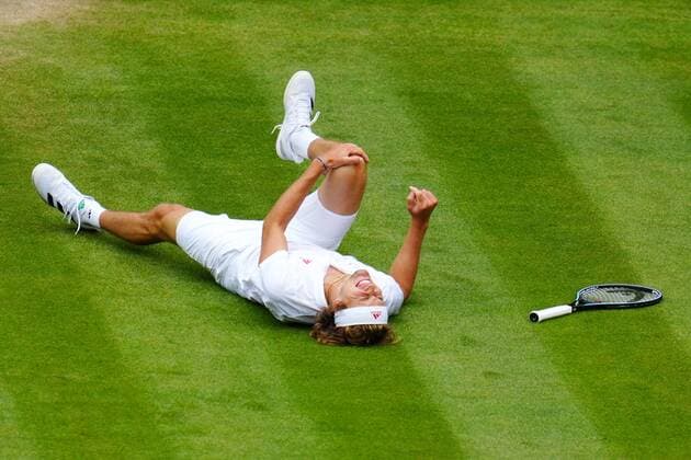 Mandatory Credit: Photo by Javier Garcia Shutterstock (12196117ka) Alexander Zverev oin the ground, injured, during his fourth round match Wimbledon Tennis Championships, Day 7, The All England Lawn Tennis and Croquet Club, London, UK - 05 Jul 2021 Wimbledon Tennis Championships, Day 7, The All England Lawn Tennis and Croquet Club, London, UK - 05 Jul 2021 Copyright: xJavierxGarcia Shutterstockx 12196117ka