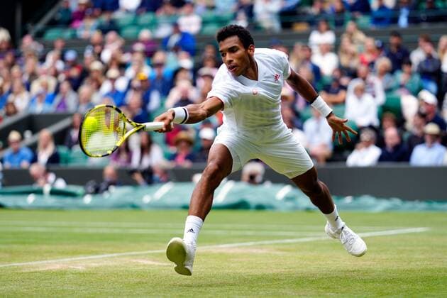 Mandatory Credit: Photo by Shutterstock (12196118ge) Felix Auger-Aliassime during his fourth round match Wimbledon Tennis Championships, Day 7, The All England Lawn Tennis and Croquet Club, London, UK - 05 Jul 2021 Wimbledon Tennis Championships, Day 7, The All England Lawn Tennis and Croquet Club, London, UK - 05 Jul 2021  Copyright: xShutterstockx 12196118ge