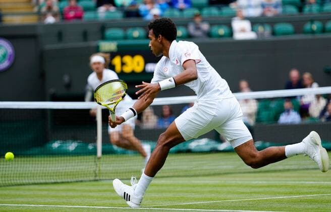 Mandatory Credit: Photo by Shutterstock (12196118gc) Felix Auger-Aliassime during his fourth round match Wimbledon Tennis Championships, Day 7, The All England Lawn Tennis and Croquet Club, London, UK - 05 Jul 2021 Wimbledon Tennis Championships, Day 7, The All England Lawn Tennis and Croquet Club, London, UK - 05 Jul 2021  Copyright: xShutterstockx 12196118gc
