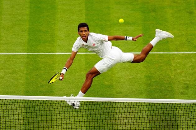 Mandatory Credit: Photo by Javier Garcia Shutterstock (12196117kw) Felix Auger-Aliassime during his fourth round match Wimbledon Tennis Championships, Day 7, The All England Lawn Tennis and Croquet Club, London, UK - 05 Jul 2021 Wimbledon Tennis Championships, Day 7, The All England Lawn Tennis and Croquet Club, London, UK - 05 Jul 2021  Copyright: xJavierxGarcia Shutterstockx 12196117kw