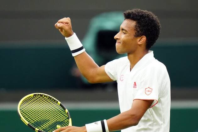 Mandatory Credit: Photo by Shutterstock (12196118hh) Felix Auger-Aliassime celebrates victory in his fourth round match Wimbledon Tennis Championships, Day 7, The All England Lawn Tennis and Croquet Club, London, UK - 05 Jul 2021 Wimbledon Tennis Championships, Day 7, The All England Lawn Tennis and Croquet Club, London, UK - 05 Jul 2021  Copyright: xShutterstockx 12196118hh