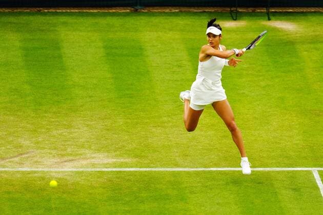 Mandatory Credit: Photo by Javier Garcia Shutterstock (12196117lq) Emma Raducanu during her fourth round match Wimbledon Tennis Championships, Day 7, The All England Lawn Tennis and Croquet Club, London, UK - 05 Jul 2021 Wimbledon Tennis Championships, Day 7, The All England Lawn Tennis and Croquet Club, London, UK - 05 Jul 2021  Copyright: xJavierxGarcia Shutterstockx 12196117lq