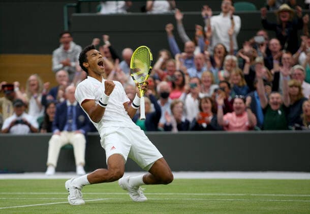 Mandatory Credit: Photo by Shutterstock (12196120ai) Felix Auger Aliassime of Canada celebrates on match point Wimbledon Tennis Championships, Day 7, The All England Lawn Tennis and Croquet Club, London, UK - 05 Jul 2021 Wimbledon Tennis Championships, Day 7, The All England Lawn Tennis and Croquet Club, London, UK - 05 Jul 2021  Copyright: xShutterstockx 12196120ai