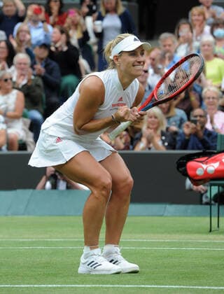 Lawn Tennis - 2021 All England Championships - Week Two - Tuesday - Wimbledon Ladies - Karolina Muchova v Angelique Kerber Angelique Kerber of Germany celebrates winning the match 