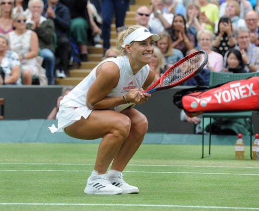 Lawn Tennis - 2021 All England Championships - Week Two - Tuesday - Wimbledon Ladies - Karolina Muchova v Angelique Kerber Angelique Kerber of Germany celebrates winning the match 