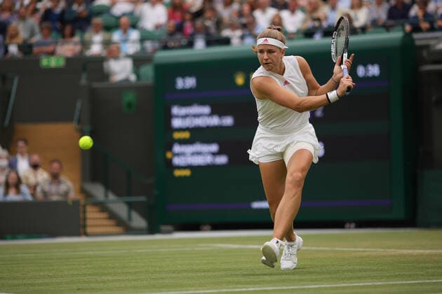 (210707) -- LONDON, July 7, 2021 -- Karolina Muchova of the Czech Republic hits a return during the woman s quarterfinal match between Karolina Muchova of the Czech Republic and Angelique Kerber of Germany at Wimbledon tennis Championship in London, Britain, on July 6, 2021. (Photo by Xinhua) (SP)BRITAIN-LONDON-TENNIS-WIMBLEDON TimxIreland 