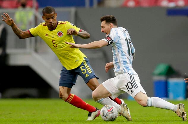 (210707) -- BRASILIA, July 7, 2021 -- Lionel Messi (R) of Argentina vies with Wilmar Barrios of Colombia during the 2021 Copa America Semifinals football match between Argentina and Colombia in Brasilia, Brazil, on July 6, 2021. (Photo by Xinhua) (SP)BRAZIL-BRASILIA-COPA AMERICA-SEMIFINALS-ARGENTINA VS COLOMBIA LucioxTavora 