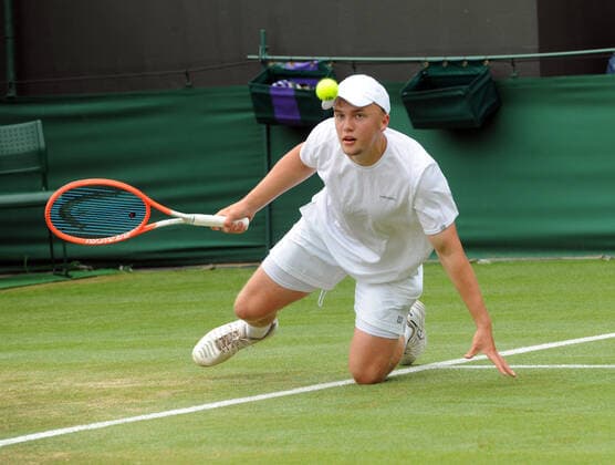 Lawn Tennis - 2021 All England Championships - Week Two - Wednesday - Wimbledon Boys event - Pedro Boscardin v Billy Blaydes Billy Blaydes of GBR slips on the grass 
