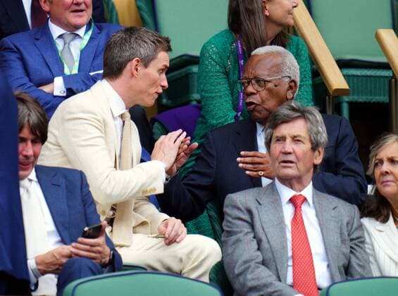 Mandatory Credit: Photo by Javier Garcia Shutterstock (12199110c) Eddie Redmayne and Trevor McDonald in the Royal Box on Centre Court Wimbledon Tennis Championships, Day 9, The All England Lawn Tennis and Croquet Club, London, UK - 07 Jul 2021 Wimbledon Tennis Championships, Day 9, The All England Lawn Tennis and Croquet Club, London, UK - 07 Jul 2021  Copyright: xJavierxGarcia Shutterstockx 12199110c