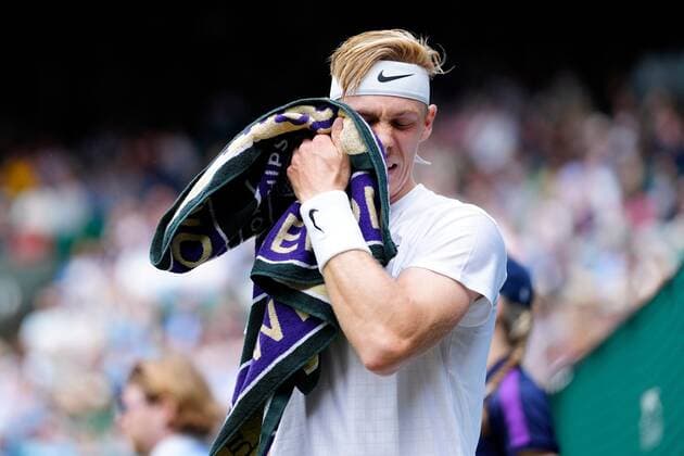 Mandatory Credit: Photo by Shutterstock (12199111co) Denis Shapovalov with a towel during his quarter-final match Wimbledon Tennis Championships, Day 9, The All England Lawn Tennis and Croquet Club, London, UK - 07 Jul 2021 Wimbledon Tennis Championships, Day 9, The All England Lawn Tennis and Croquet Club, London, UK - 07 Jul 2021  Copyright: xShutterstockx 12199111co