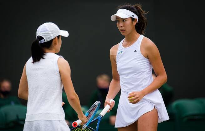 Mandatory Credit: Photo by Rob Prange Shutterstock (12199113am) Shuko Aoyama & Ena Shibahara of Japan in action during the doubles quarter-final at the 2021 Wimbledon Championships Grand Slam tennis tournament Wimbledon Tennis Championships, Day 9, The All England Lawn Tennis and Croquet Club, London, UK - 07 Jul 2021 Wimbledon Tennis Championships, Day 9, The All England Lawn Tennis and Croquet Club, London, UK - 07 Jul 2021  Copyright: xRobxPrange Shutterstockx 12199113am