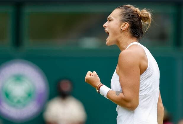 (210709) -- LONDON, July 9, 2021 -- Aryna Sabalenka of Belarus celebrates during the women s singles semifinal between Aryna Sabalenka of Belarus and Karolina Pliskova of Czech Republic at Wimbledon tennis Championship in London, Britain, on July 8, 2021. ) (SP)BRITAIN-LONDON-TENNIS-WIMBLEDON-SEMIFINAL HanxYan 