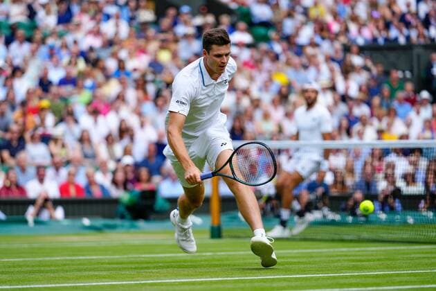 Mandatory Credit: Photo by Shutterstock (12202136ap) Hubert Hurkacz and Matteo Berrettini during their semi-final match Wimbledon Tennis Championships, Day 11, The All England Lawn Tennis and Croquet Club, London, UK - 09 Jul 2021 Wimbledon Tennis Championships, Day 11, The All England Lawn Tennis and Croquet Club, London, UK - 09 Jul 2021  Copyright: xShutterstockx 12202136ap