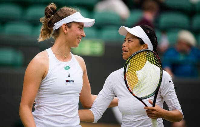 Mandatory Credit: Photo by Rob Prange Shutterstock (12202162b) Elise Mertens of Belgium & Su-Wei Hsieh of Chinese Taipeh in actin during the doubles semi-final of the 2021 Wimbledon Championships Grand Slam tennis tournament Wimbledon Tennis Championships, Day 11, The All England Lawn Tennis and Croquet Club, London, UK - 09 Jul 2021 Wimbledon Tennis Championships, Day 11, The All England Lawn Tennis and Croquet Club, London, UK - 09 Jul 2021  Copyright: xRobxPrange Shutterstockx 12202162b