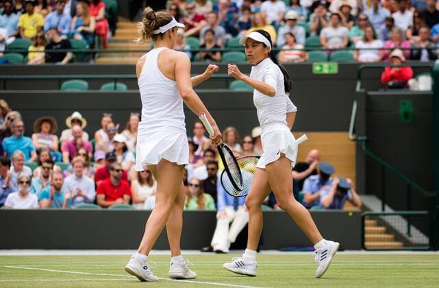 Mandatory Credit: Photo by Rob Prange Shutterstock (12202162n) Elise Mertens of Belgium & Su-Wei Hsieh of Chinese Taipeh in actin during the doubles semi-final of the 2021 Wimbledon Championships Grand Slam tennis tournament Wimbledon Tennis Championships, Day 11, The All England Lawn Tennis and Croquet Club, London, UK - 09 Jul 2021 Wimbledon Tennis Championships, Day 11, The All England Lawn Tennis and Croquet Club, London, UK - 09 Jul 2021  Copyright: xRobxPrange Shutterstockx 12202162n