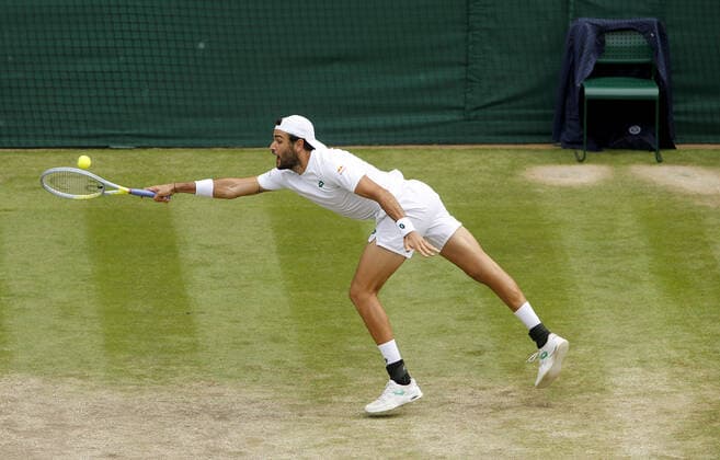 Mandatory Credit: Photo by Shutterstock (12202161h) Matteo Berrettini of Italy in action Wimbledon Tennis Championships, Day 11, The All England Lawn Tennis and Croquet Club, London, UK - 09 Jul 2021 Wimbledon Tennis Championships, Day 11, The All England Lawn Tennis and Croquet Club, London, UK - 09 Jul 2021  Copyright: xShutterstockx 12202161h