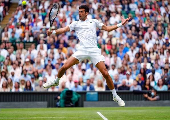 Mandatory Credit: Photo by Shutterstock (12202136ce) Novak Djokovic during his semi-final match Wimbledon Tennis Championships, Day 11, The All England Lawn Tennis and Croquet Club, London, UK - 09 Jul 2021 Wimbledon Tennis Championships, Day 11, The All England Lawn Tennis and Croquet Club, London, UK - 09 Jul 2021  Copyright: xShutterstockx 12202136ce